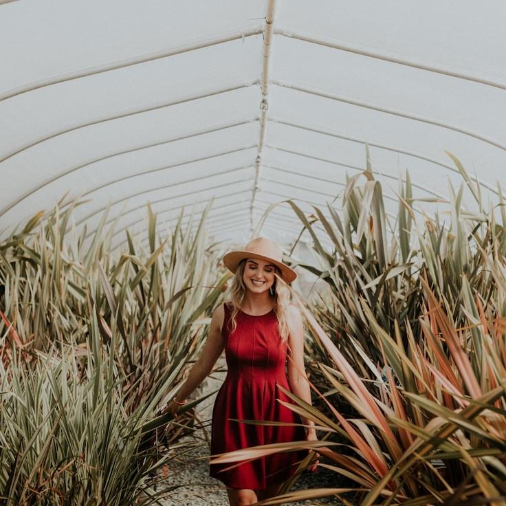 Kaveri Mehta, Lead Design Curator at ShoreCanvasGrove, reviewing corporate floral arrangements